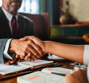 Handshake between attorney and client