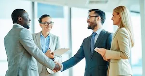 Two business men shaking hands on a meeting